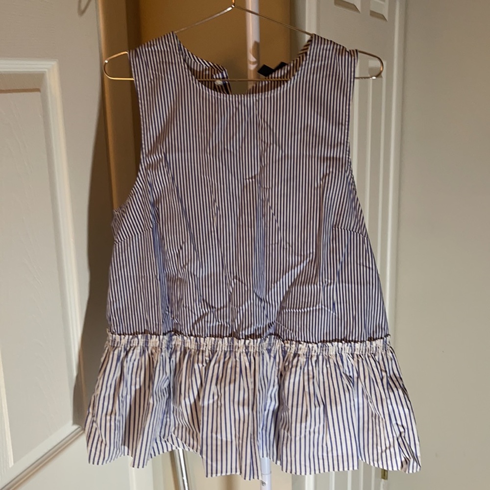 Blue and white striped sleeveless top